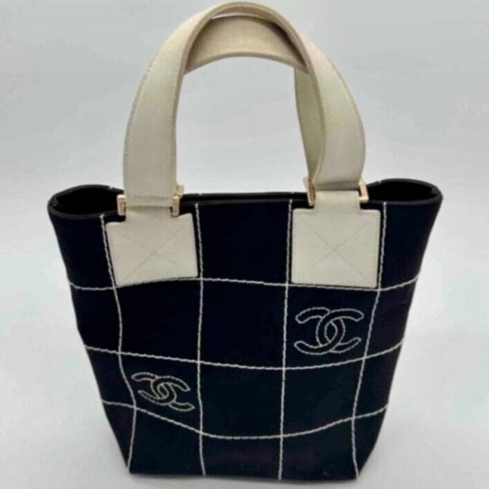 CHANEL Black Tote with Cream Handles and Grid Stitching